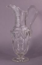 A Victorian cut-glass claret jug with etched flower sprays to the tapered body, on round pedestal