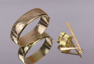 An abstract-form brooch set large square-cut citrine, the yellow metal mount marked “18”; & a 9ct (