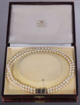 A double-row cultured pearl necklace, each row with fifty-eight pearls of near uniform size, the