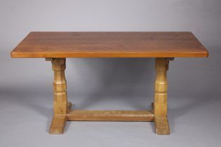 ROBERT THOMPSON OF KILBURN: A ‘MOUSEMAN’ OAK DINING TABLE, with rectangular top with adzed