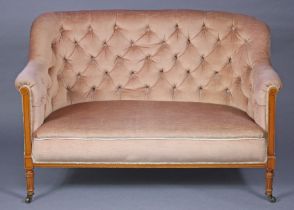 A late Victorian small sofa upholstered salmon-pink velour, the show-wood frame with inlaid roundels