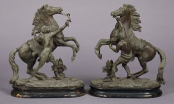 A pair of late 19th century speltre Marley horses, each on an ebonised wooden plinth, 40cm high x