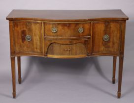 A late 19th century regency-style inlaid-mahogany sideboard, of serpentine shape, fitted two deep