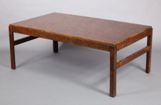 A mid-20th century Danish rosewood coffee table inset embossed copper rectangular top with
