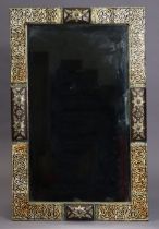 An eastern hardwood ‘Zanzibar’ rectangular wall mirror with decorative bone inlay, gilt-metal mounts
