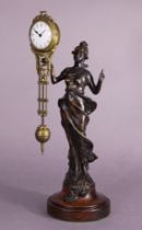 A late 19th/early 20thC bronze ‘mystery clock’ in the form of a classical female figure holding