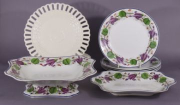 Seven items of 19th century Wedgwood creamware decorated with garlands of purple flowers, vines &