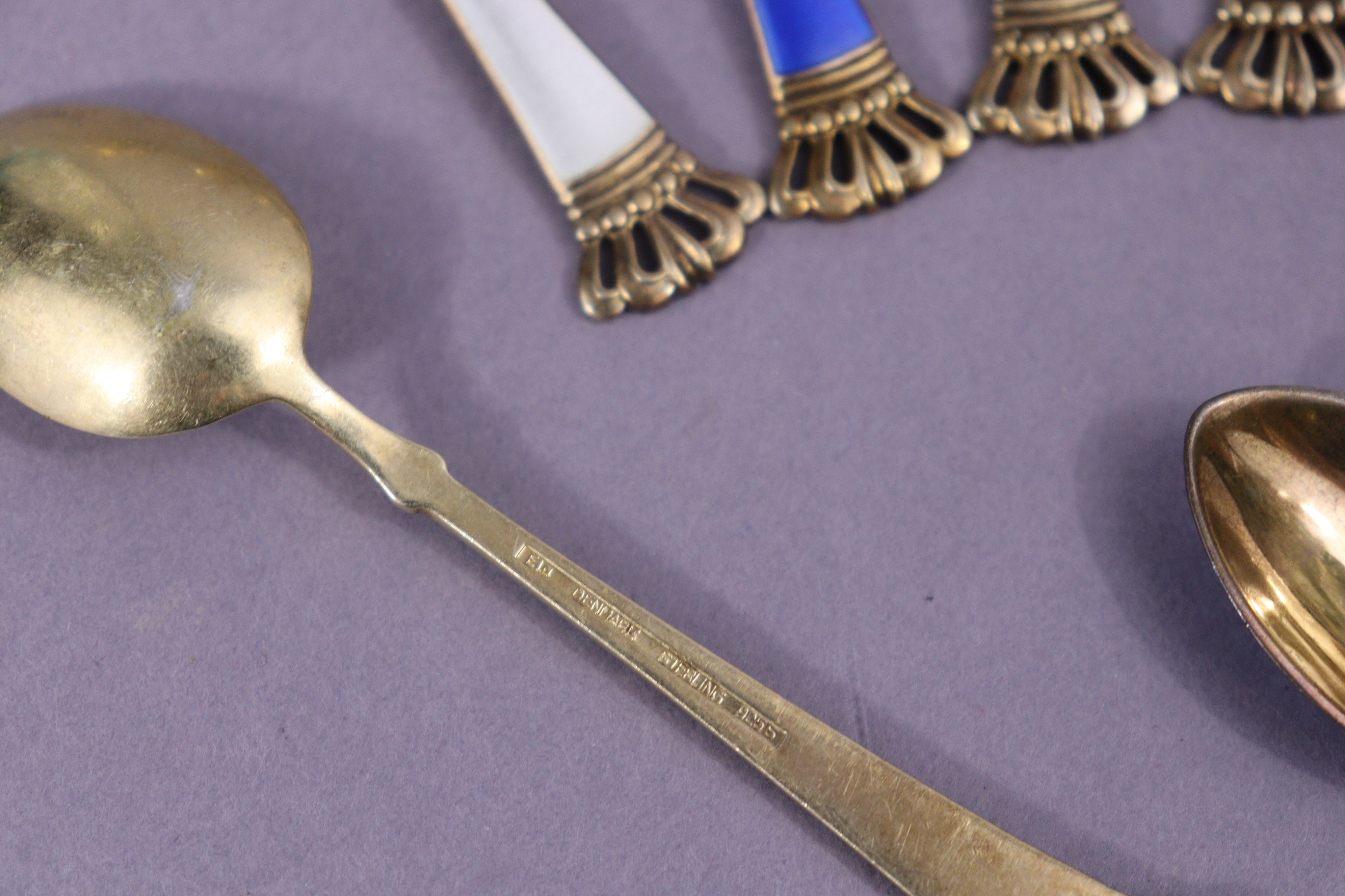 A set of six Danish sterling silver-gilt & harlequin enamel coffee spoons with crown terminals; - Image 3 of 3