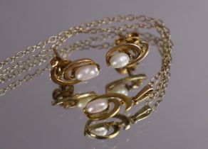 A 9ct. gold pendant set small baroque pearl, on 9ct. fine-link chain necklace; & pair matching