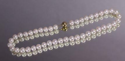 A single-row necklace of forty three freshwater pearls of uniform size, approx. 9.5mm dia., the
