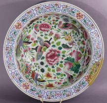 A 19th century Cantonese large porcelain circular basin with famille rose decoration of birds,