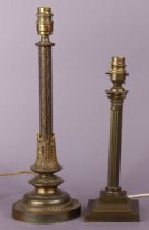 A late 19th/early 20th century gilt-brass table lamp with tapered column, on circular base,