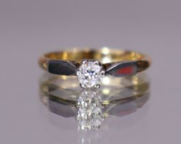 A diamond solitaire, the round old-cut stone weighting approx. 0.35 carat, claw-set to an 18ct