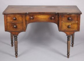 A Victorian inlaid mahogany kneehole desk fitted five graduated drawers with turned wooden