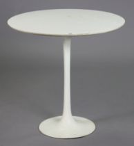 A 1970s Arkana tulip-design white-finish dining table with a circular top, & on a pedestal foot,