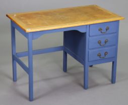 A natural & blue painted oak typist’s desk fitted three long drawers to the right-hand side, & on