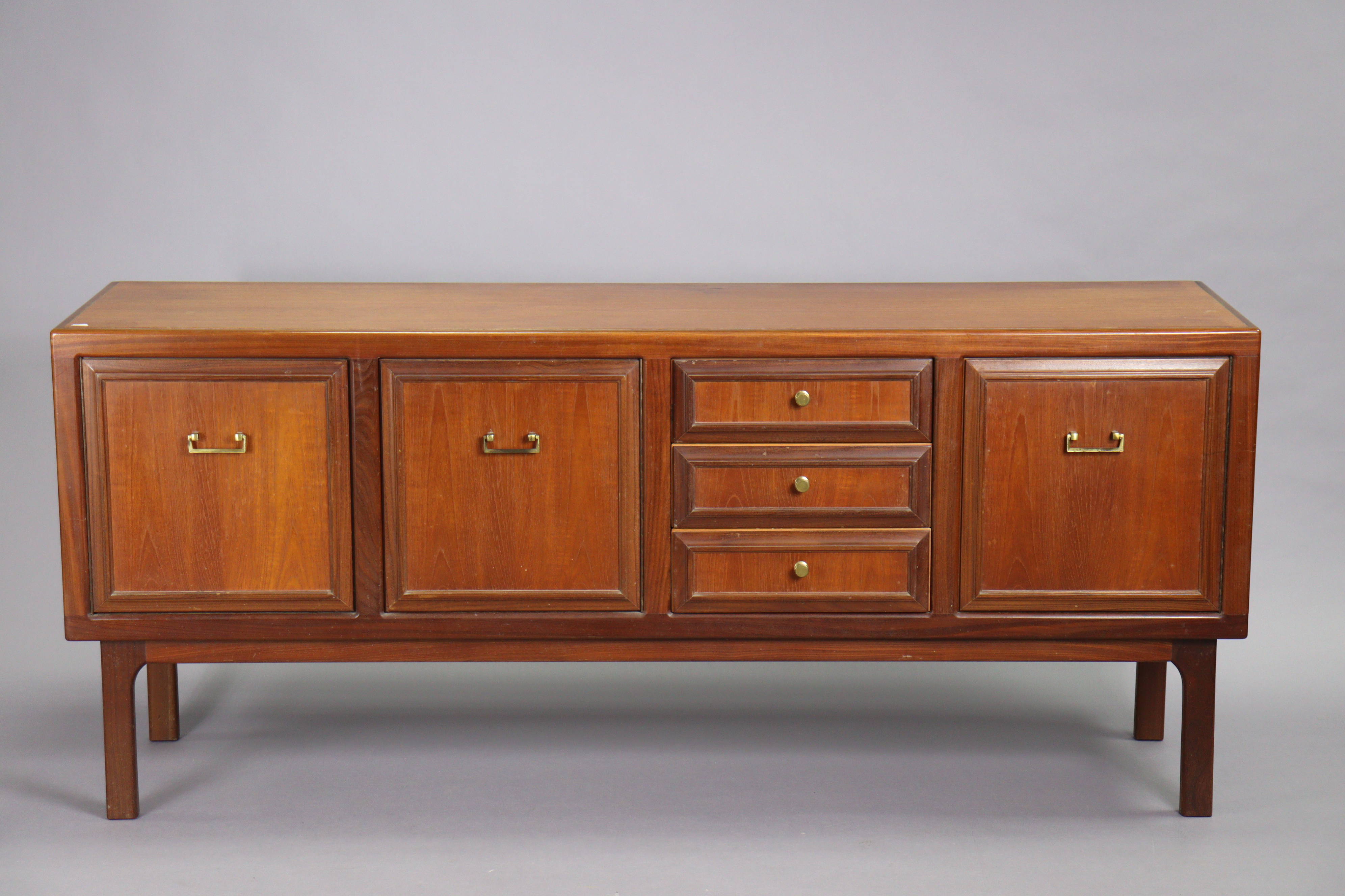 A 1970’s teak circular extending dining table with an additional leaf, & on four square tapered - Image 12 of 17