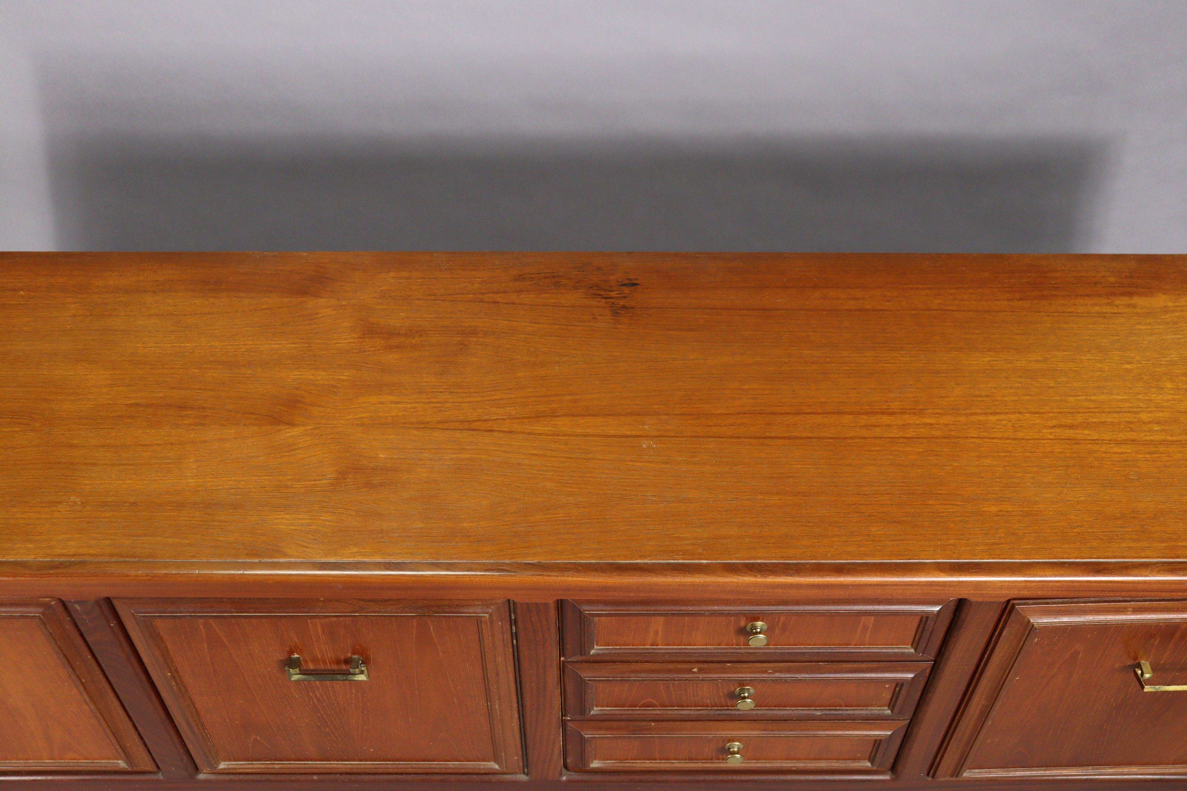 A 1970’s teak circular extending dining table with an additional leaf, & on four square tapered - Image 16 of 17