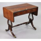 A reproduction mahogany sofa table fitted two frieze drawer, & on lyre-shaped end supports & splay