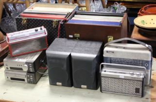 A Kenwood hi/fi system; three portable radios; & various LP records.