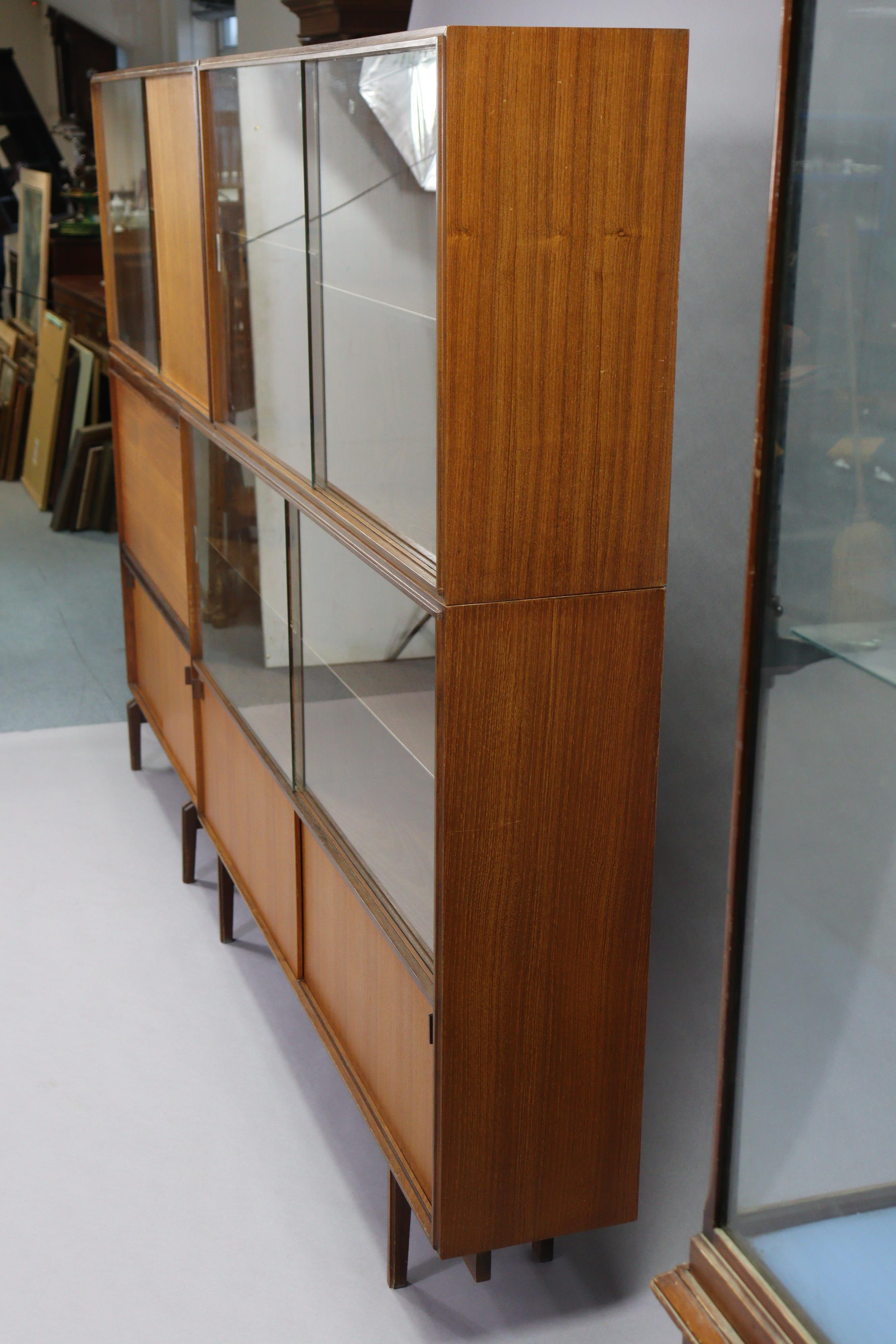 A mid-20th century teak tall wall unit fitted with an arrangement of shelves & cupboards, & on short - Image 2 of 10