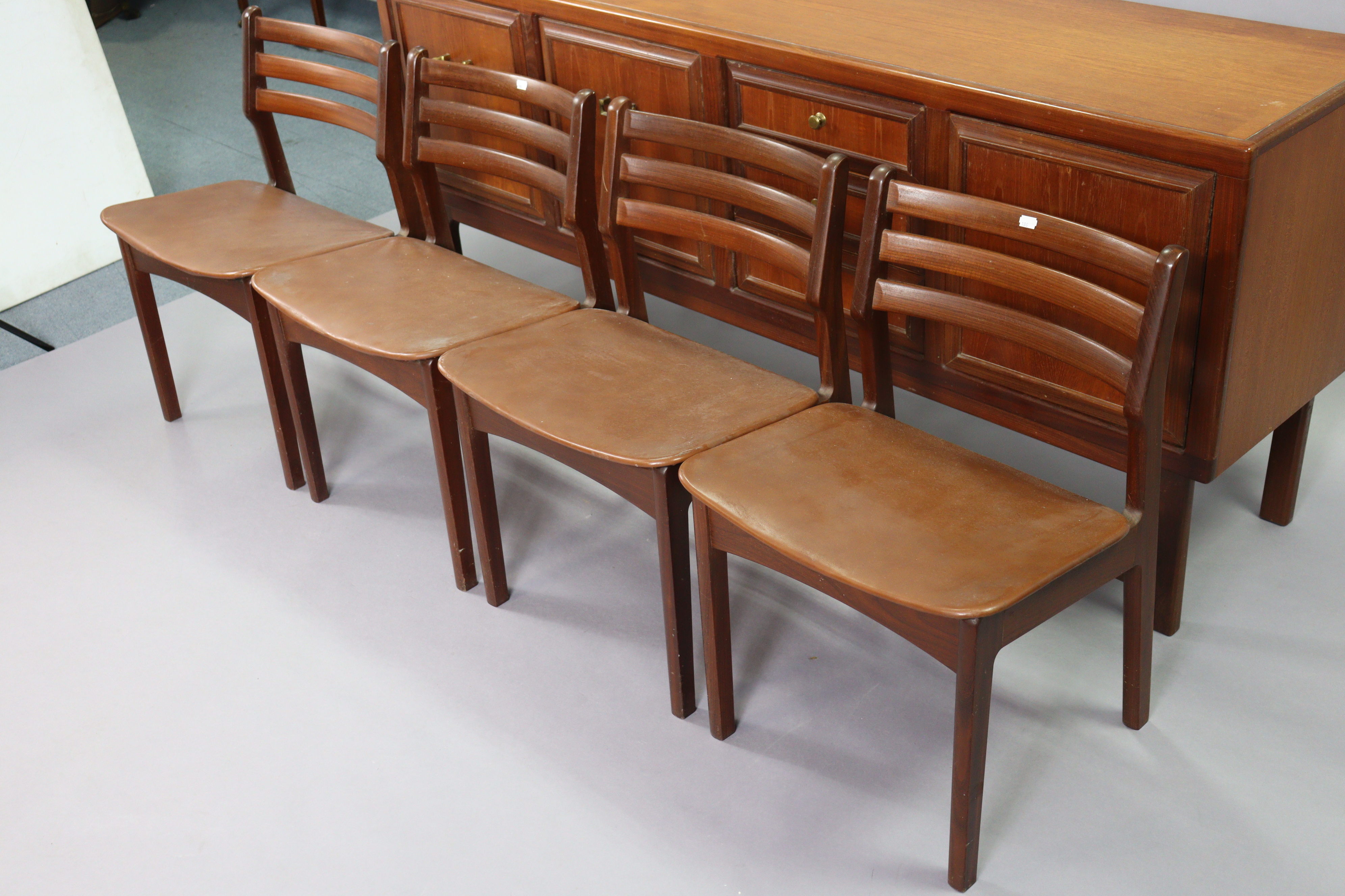 A 1970’s teak circular extending dining table with an additional leaf, & on four square tapered - Image 8 of 17