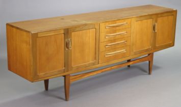 A G-Plan teak sideboard fitted four long drawers to centre flanked by a cupboard to either side