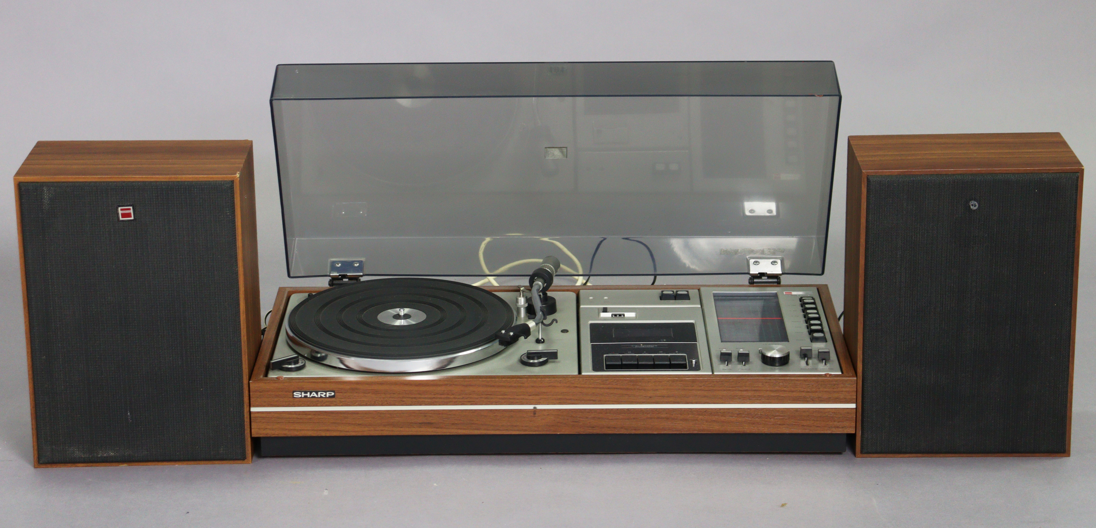 A Sharp stereo music system (model no. SG-309H).