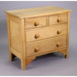 A walnut small chest fitted two short & two long graduated drawers with turned knob handles, 91cm