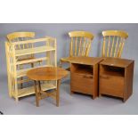 A pair of teak bedside cupboards, 40.5cm wide x 55cm high; a circular occasional table; a fold-