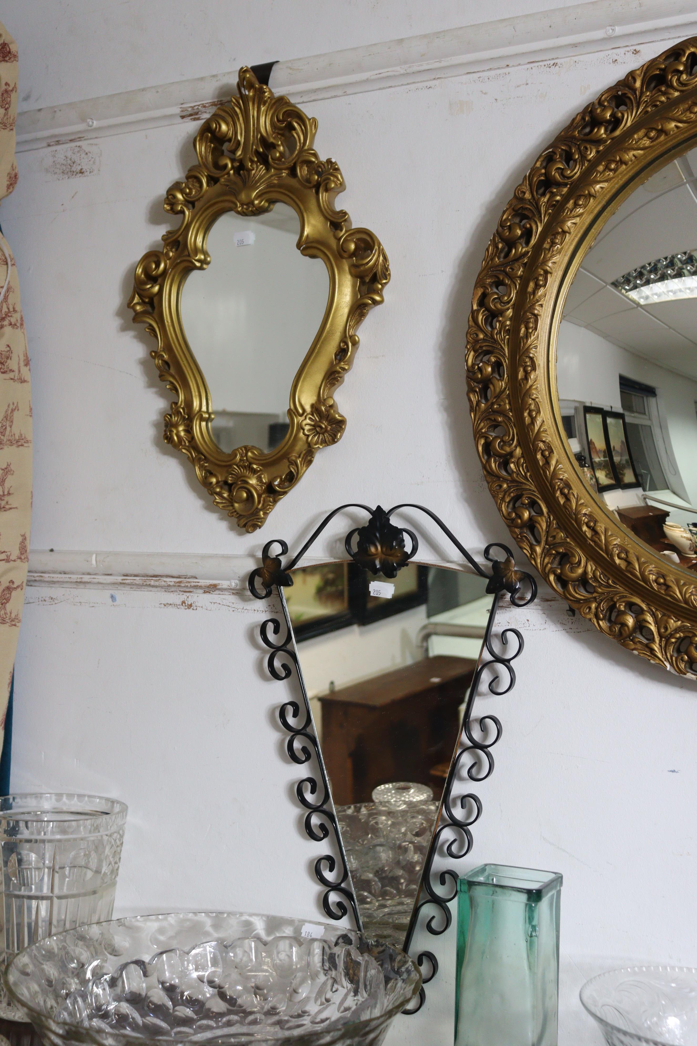 A gilt frame convex wall mirror with a pierced & raised scroll border, 59cm diameter; together - Image 3 of 5