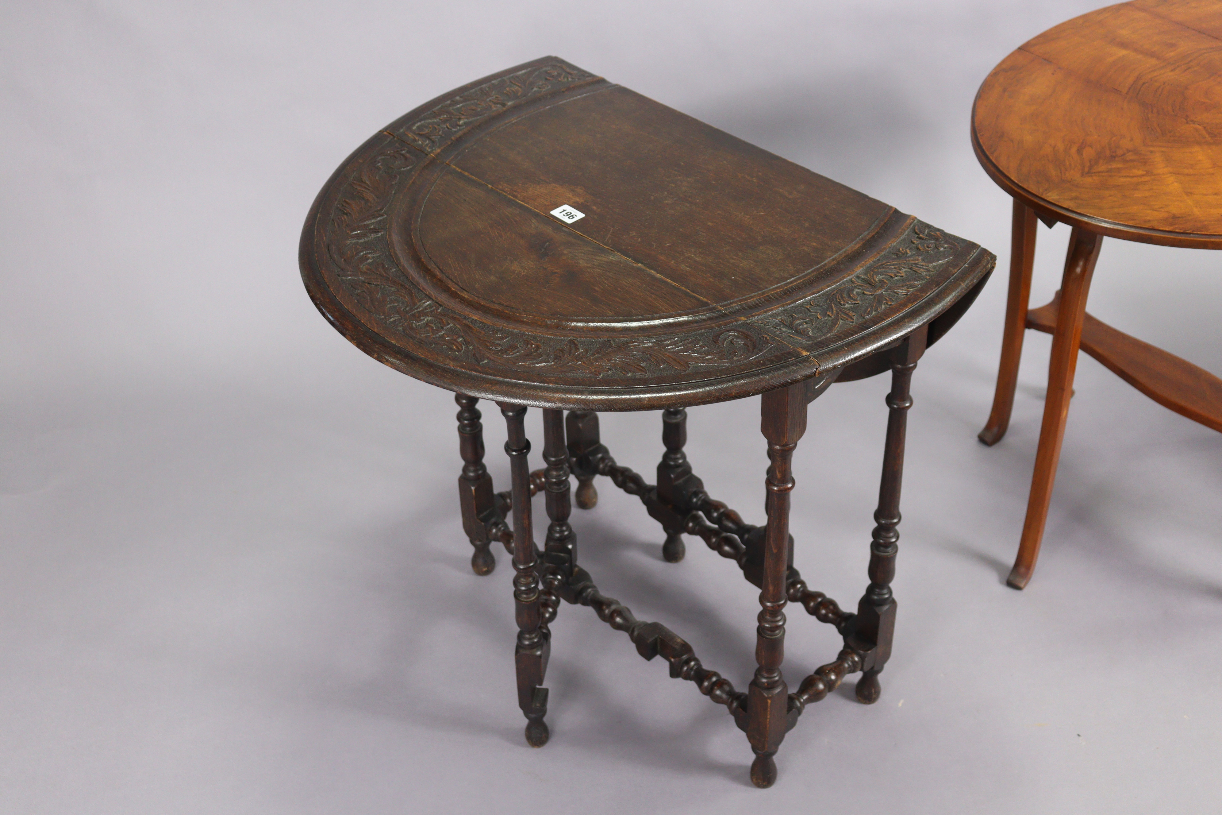 An early 20th century oak oval drop-leaf occasional table with a carved foliate border, & on - Image 3 of 4