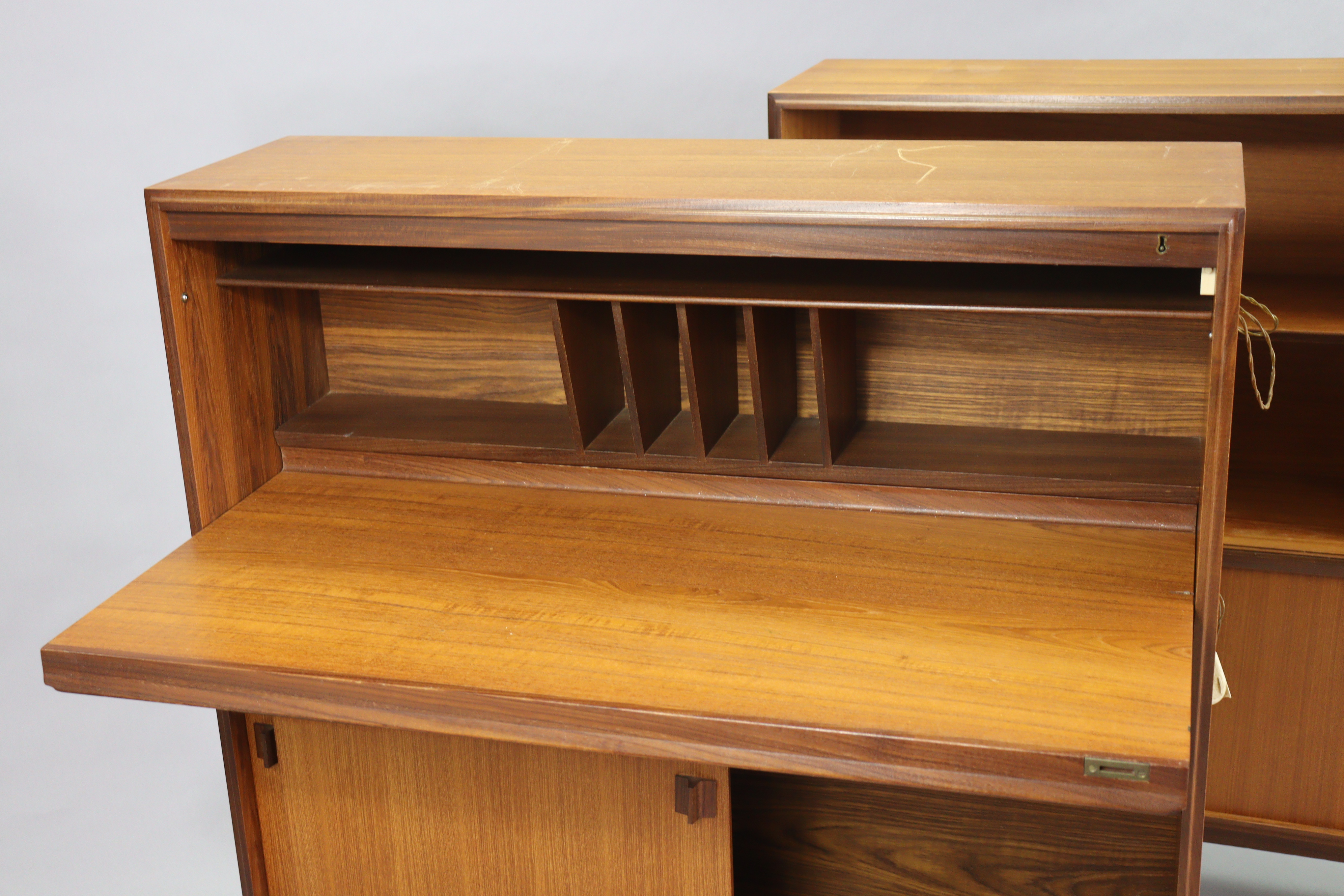 A mid-20th century teak tall wall unit fitted with an arrangement of shelves & cupboards, & on short - Image 6 of 10