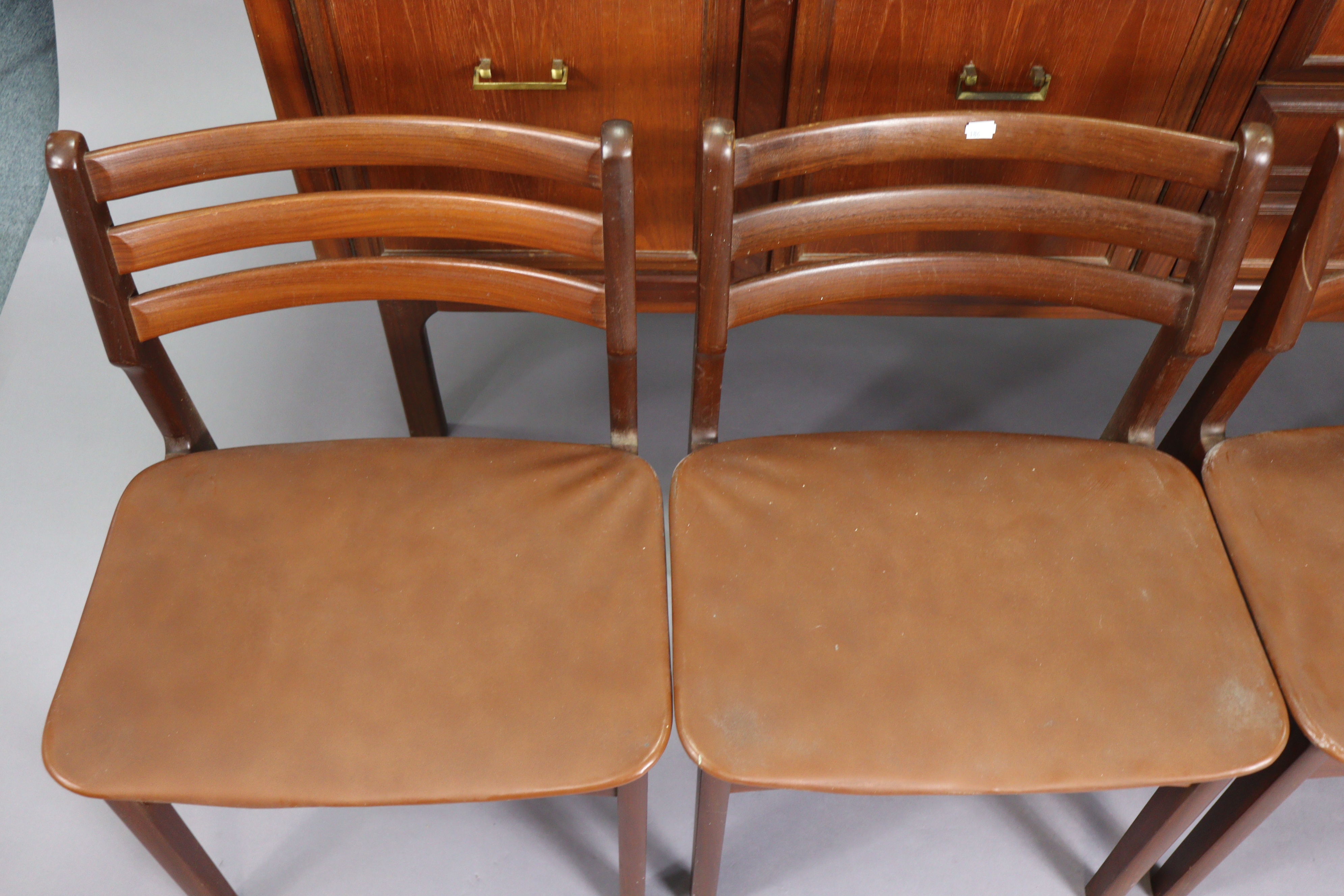 A 1970’s teak circular extending dining table with an additional leaf, & on four square tapered - Image 9 of 17