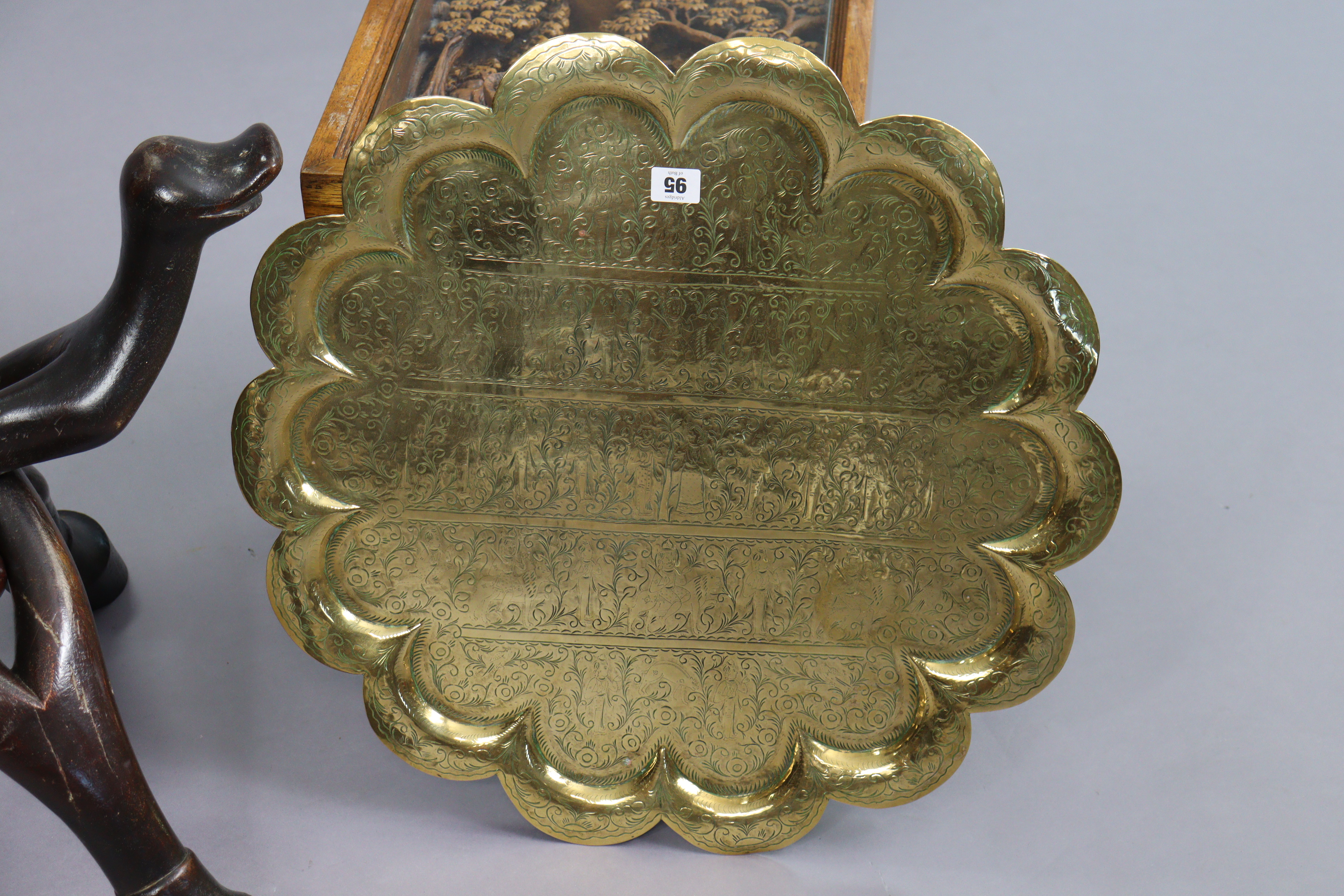 An eastern brass engraved circular occasional table on a wooden folding stand, 59cm diameter x - Image 4 of 5