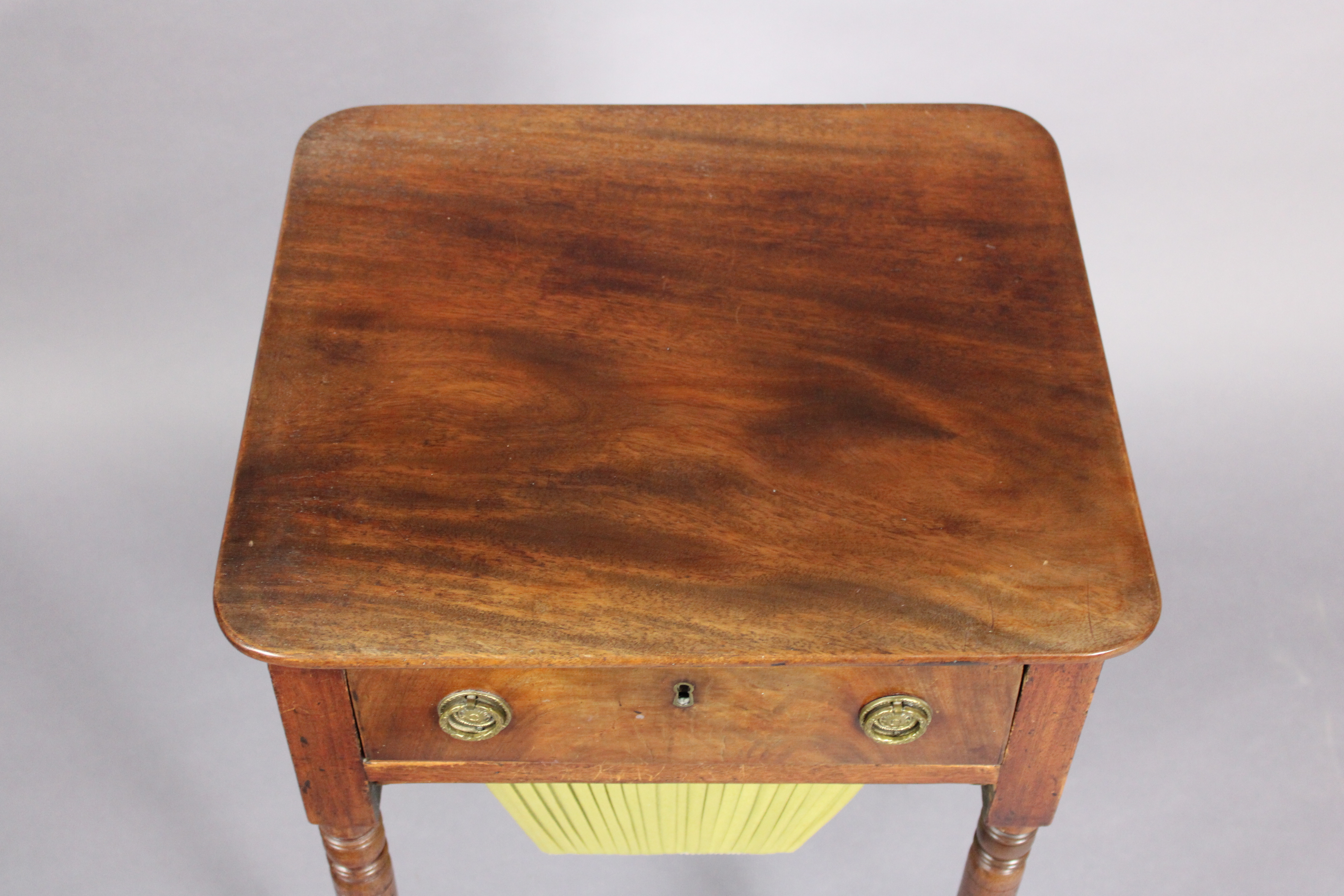 A late Georgian mahogany needlework table fitted frieze drawer with brass ring handles above a - Image 3 of 3