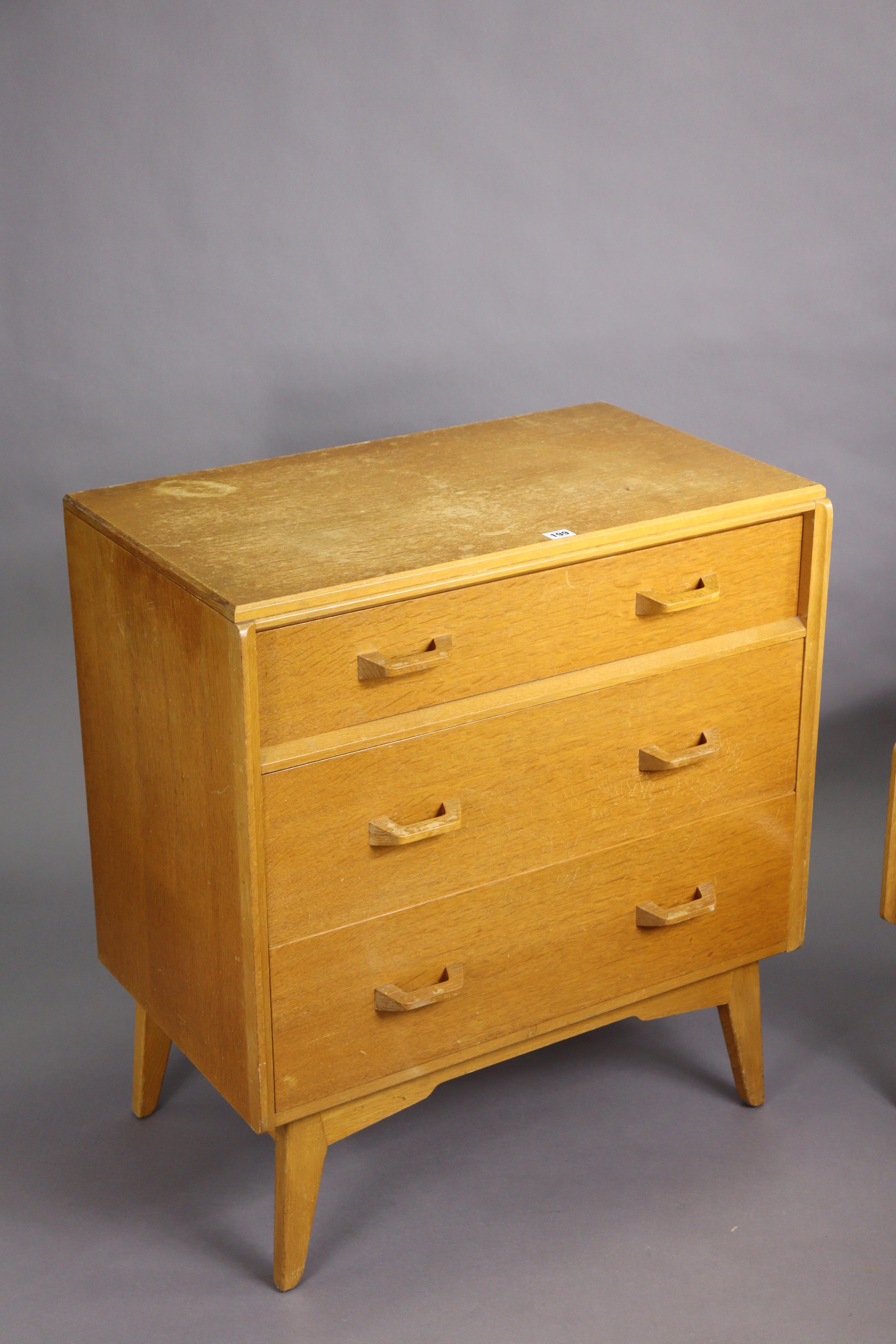 A mid-20th century E. Gomme G-Plan light oak bedroom pair comprising of a small chest of three - Image 2 of 10