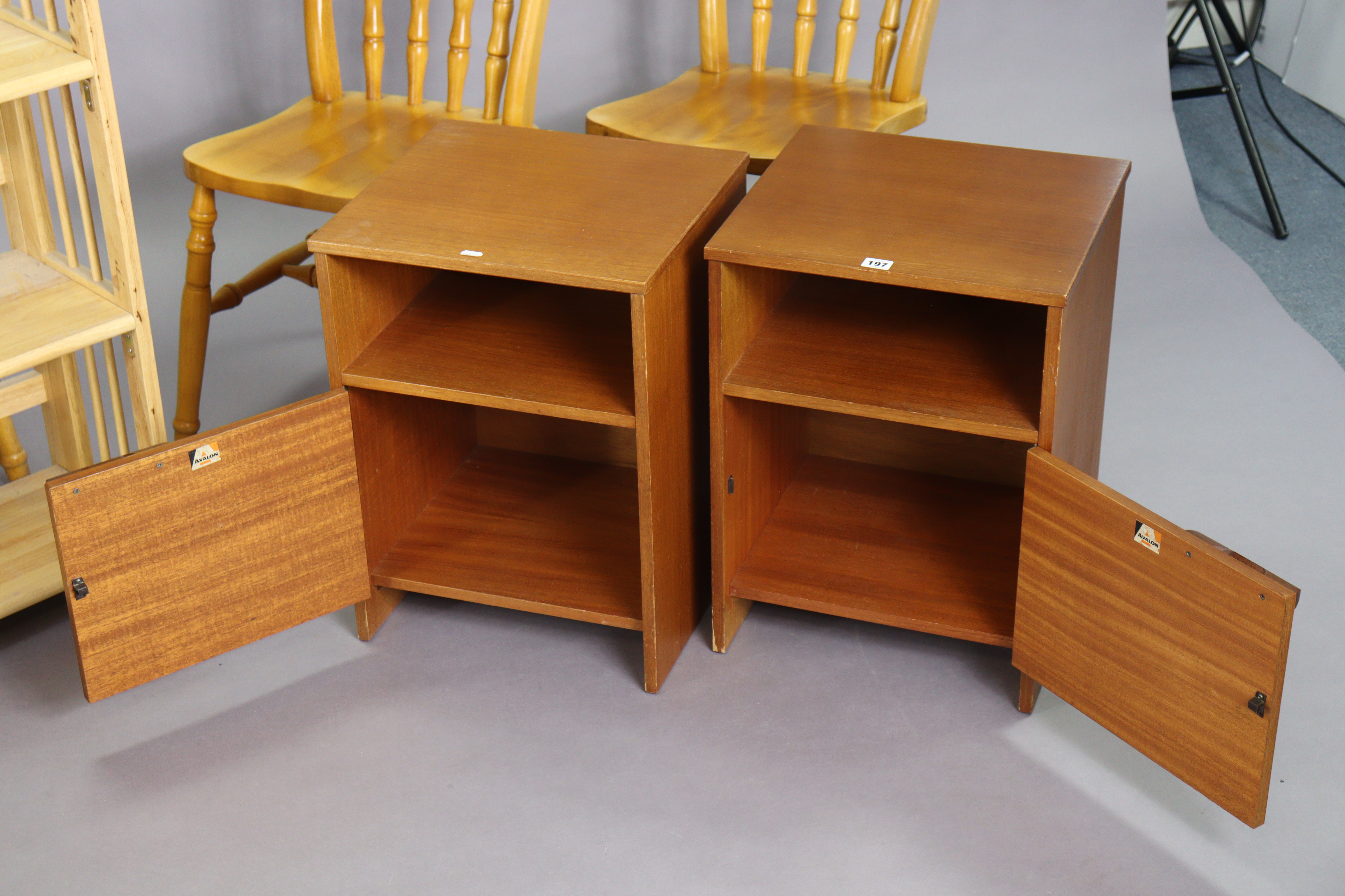 A pair of teak bedside cupboards, 40.5cm wide x 55cm high; a circular occasional table; a fold- - Image 2 of 3