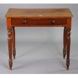 A Victorian mahogany side table with a moulded edge to the rectangular top, fitted frieze