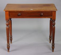 A Victorian mahogany side table with a moulded edge to the rectangular top, fitted frieze