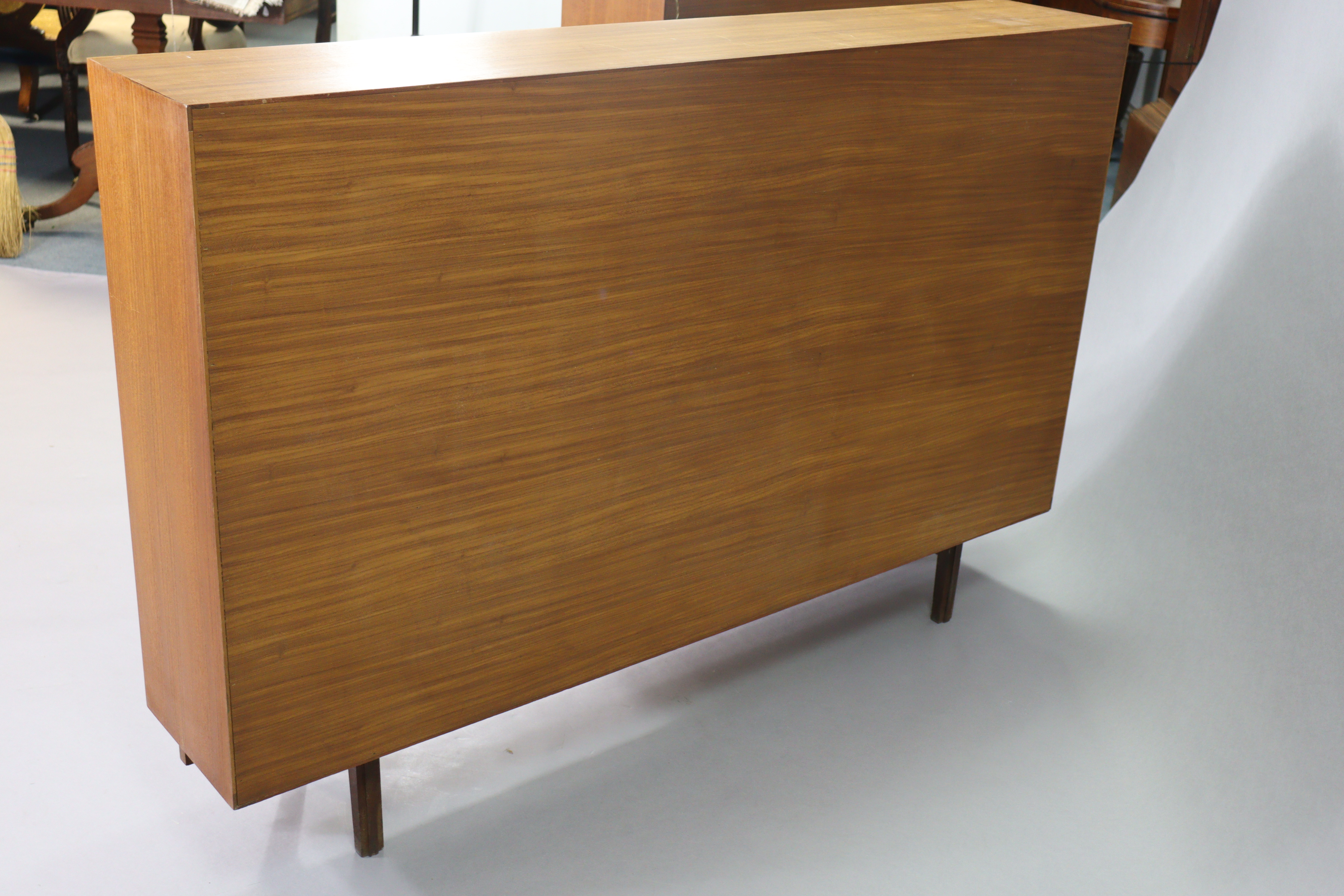 A mid-20th century teak tall wall unit fitted with an arrangement of shelves & cupboards, & on short - Image 10 of 10