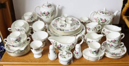 A Wedgwood bone china “Hathaway Rose” extensive sixty-six piece part dinner, tea, & coffee service.