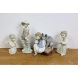Seven various Lladro porcelain figure ornaments.