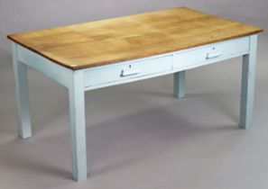 An oak kitchen table with a rectangular top, the pale blue painted underframe fitted two frieze