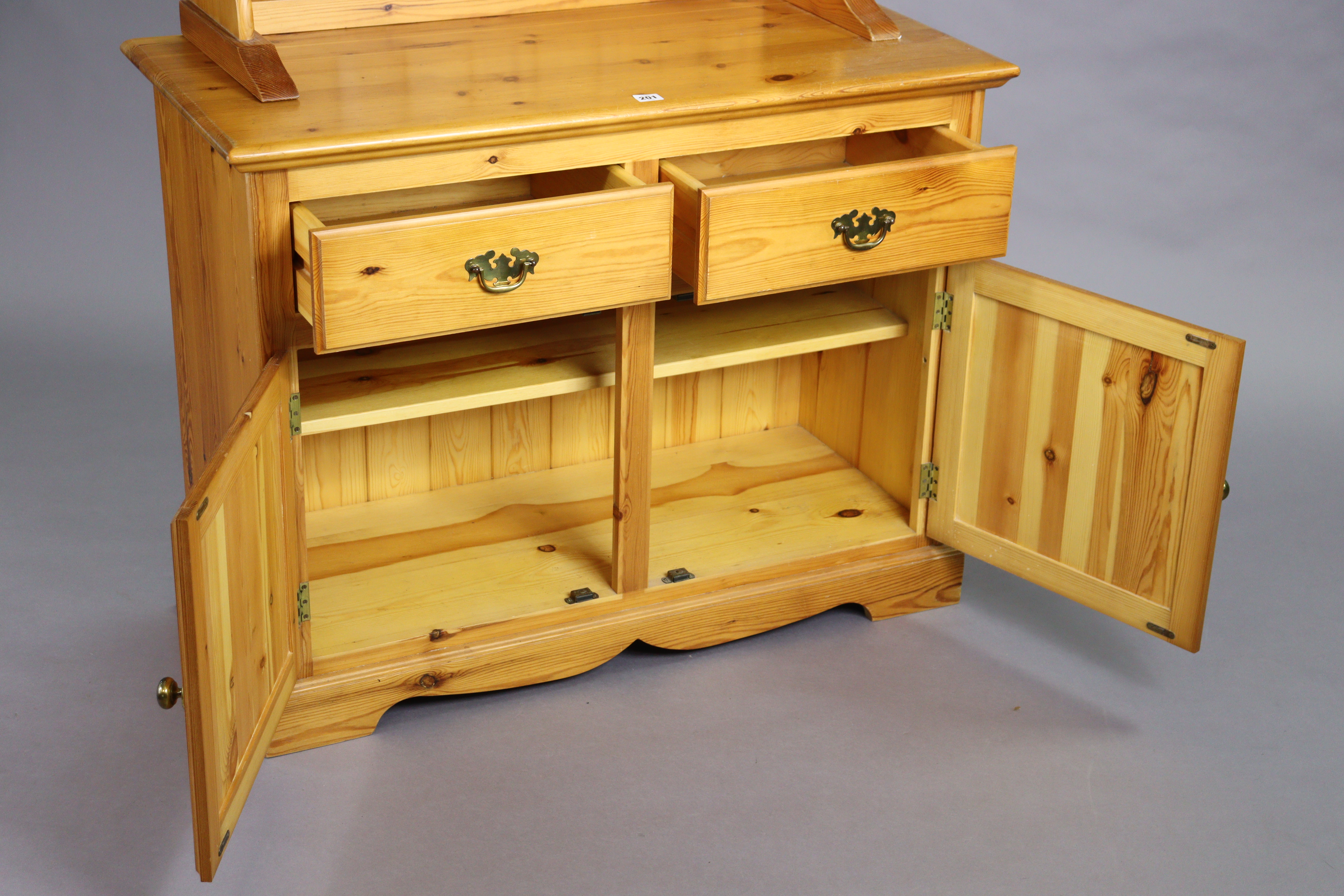 A pine small dresser the upper part with two open shelves & having a panelled base, the base - Image 2 of 3