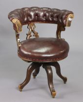 A Victorian carved oak frame & sprung seat upholstered crimson leather, on four cabriole legs with