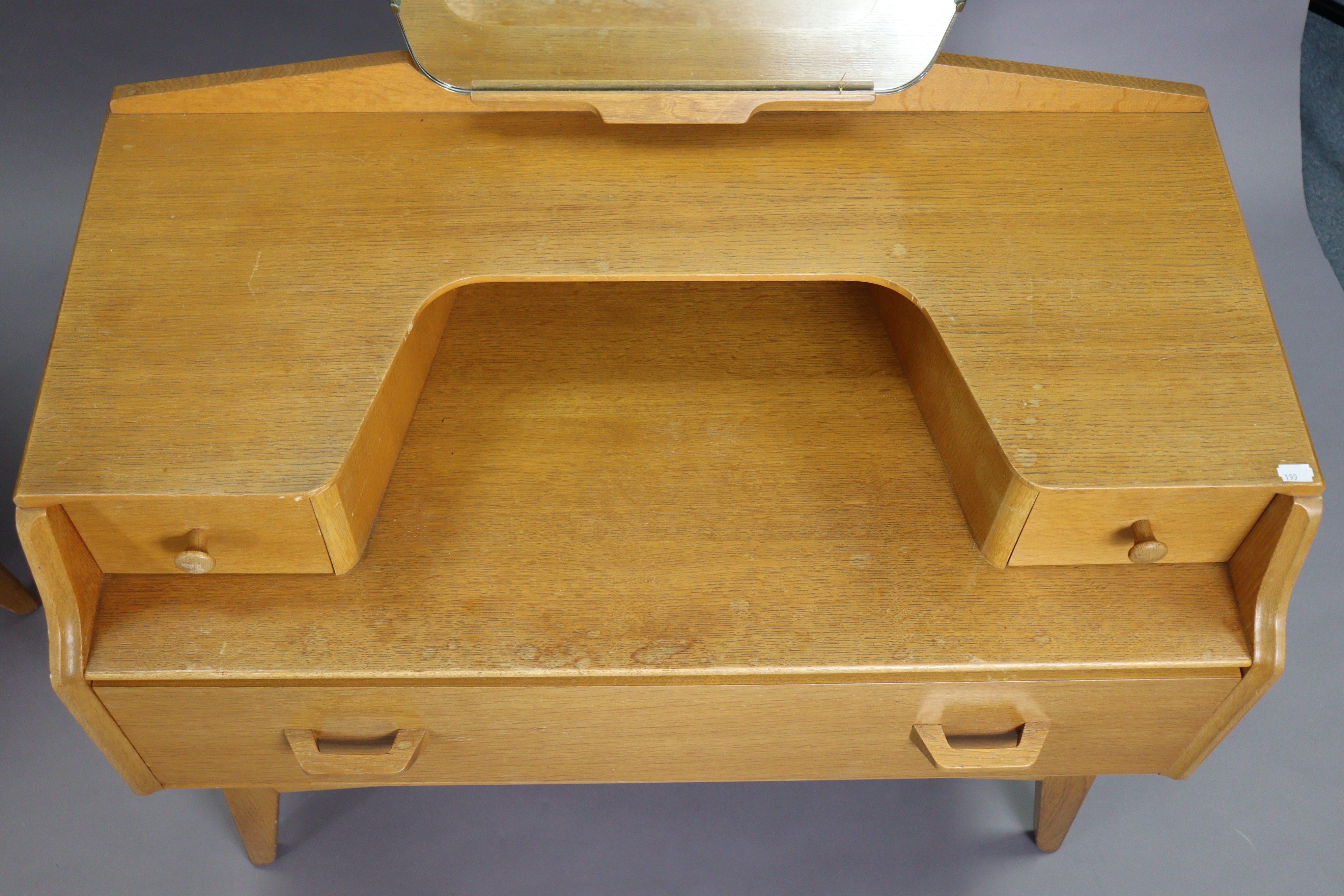 A mid-20th century E. Gomme G-Plan light oak bedroom pair comprising of a small chest of three - Image 9 of 10