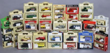Approximately thirty various scale model vehicles by Lledo, Vanguard & others, each with a