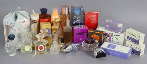 A collection of assorted perfumes, soaps, etc., boxed & unboxed.