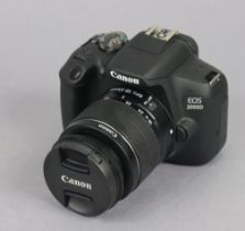 A Canon EOS 2000D camera, with lens & accessories, boxed.